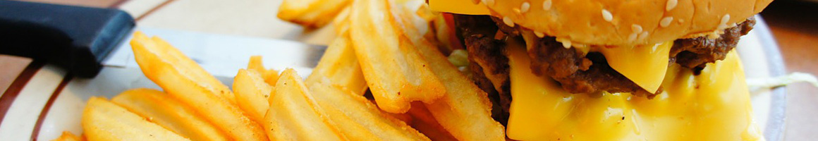 Eating Burger at Bob's Atomic Burgers restaurant in Golden, CO.